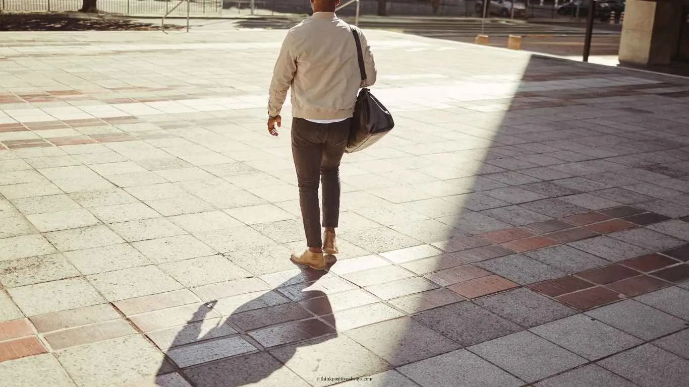 A professional walking forward with hope while considering a more fulfilling career path.